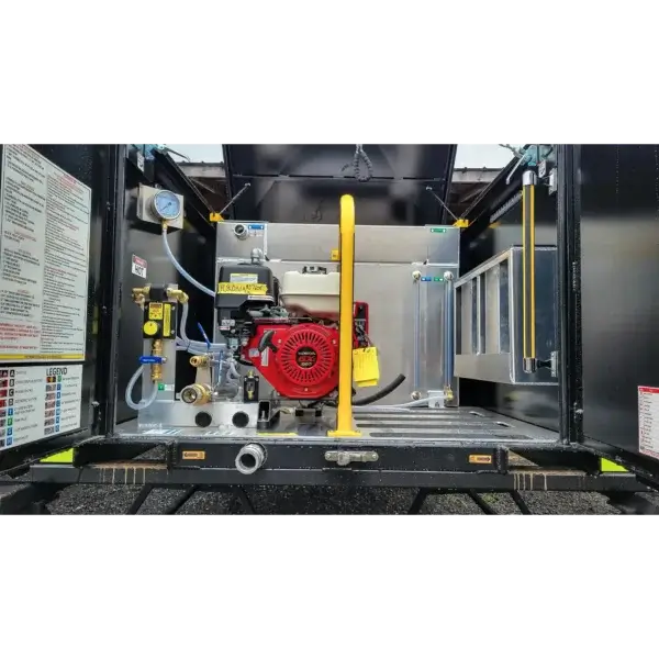 View inside a Wildcat 1150 utility trailer with industrial equipment—red engine, pipes, hoses, gauges, control panel, and yellow safety bars—ready for use by firefighter crews as vital wildfire gear in Canada. Instruction labels line the walls.