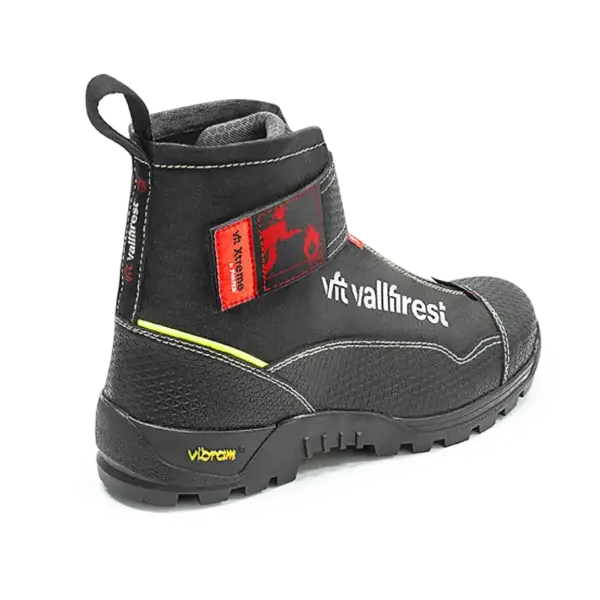 A yellow "vallfirest" Wildland Firefighter Shirt with rugged design and red fire icon patch labeled "Smoke XT." Ideal wildfire equipment for use in Canada.